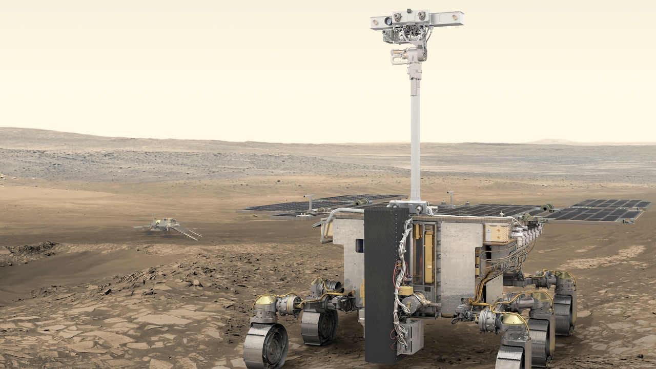 ESA’s ExoMars rover (foreground) and Russia’s stationary surface science platform (background) are scheduled for launch in July 2020, arriving at Mars in March 2021. The Trace Gas Orbiter, which has been at Mars since October 2016, will act as awill act as a relay station for the mission, as well as conducting its own science mission. Image credit: ESA