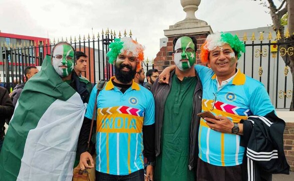 Rivals on the field, friends off it! India and Pakistan fans are all smiles ahead of the encounter in Manchester. Firstpost/Jigar Mehta Rivals on the field, friends off it! India and Pakistan fans are all smiles ahead of the encounter in Manchester. Firstpost/Jigar Mehta
