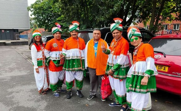 Some India fans are dressed in the tri-colour outfit. The Old Trafford stadium was dominated by Indian fans, and witnessed an entertaining match despite the rain interruption. Firstpost/Jigar Mehta Some India fans are dressed in the tri-colour outfit. The Old Trafford stadium was dominated by Indian fans, and witnessed an entertaining match despite the rain interruption. Firstpost/Jigar Mehta