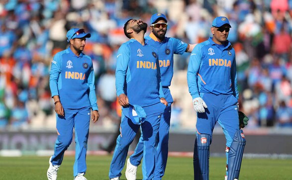 Virat Kohli leads some of his teammates back to the pavilion following India's win. The Men in Blue moved a step closer to the semi-finals with this win. AP Virat Kohli leads some of his teammates back to the pavilion following India's win. The Men in Blue moved a step closer to the semi-finals with this win. AP
