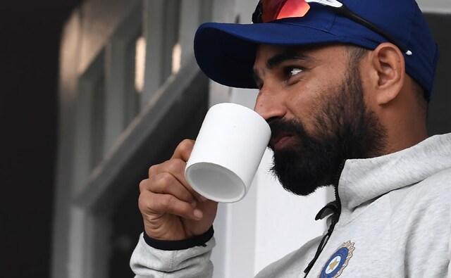 As the rain continued to come down hard at Trent Bridge, the players had no other option to keep themselves warm than sip a cup of tea or coffee. At any given point of the day they would have chosen to play to keep the body warm though. Mohammad Shami (above) was no different. AFP As the rain continued to come down hard at Trent Bridge, the players had no other option to keep themselves warm than sip a cup of tea or coffee. At any given point of the day they would have chosen to play to keep the body warm though. Mohammad Shami (above) was no different. AFP