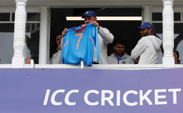 Groundsmen worked hard, umpires too strolled out and in to see if a match could be possible. India head coach Ravi Shastri tried his bit by showing the rain gods the jersey of MS Dhoni in pursuit to try and stop the downpour. On a serious note, this was Shastri keeping the spirits of fans alive by showing MSD's jersey. Although they would have loved more to see the man who wears this in action today. Reuters Groundsmen worked hard, umpires too strolled out and in to see if a match could be possible. India head coach Ravi Shastri tried his bit by showing the rain gods the jersey of MS Dhoni in pursuit to try and stop the downpour. On a serious note, this was Shastri keeping the spirits of fans alive by showing MSD's jersey. Although they would have loved more to see the man who wears this in action today. Reuters