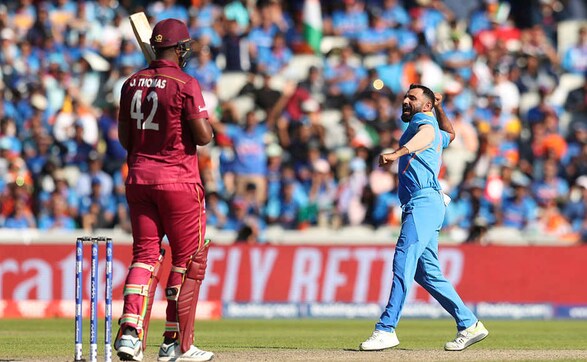 India speedster Mohammed Shami celebrates the dismissal of Oshane Thomas, who was the last to depart. West Indies, who are now knocked out, are in eighth position with just that lone win to Pakistan in their tournament opener. AP India speedster Mohammed Shami celebrates the dismissal of Oshane Thomas, who was the last to depart. West Indies, who are now knocked out, are in eighth position with just that lone win to Pakistan in their tournament opener. AP
