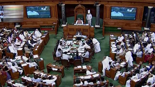 Bill to link voter ID, Aadhaar card passed in Lok Sabha amid Opposition uproar Bill to link voter ID, Aadhaar card passed in Lok Sabha amid Opposition uproar