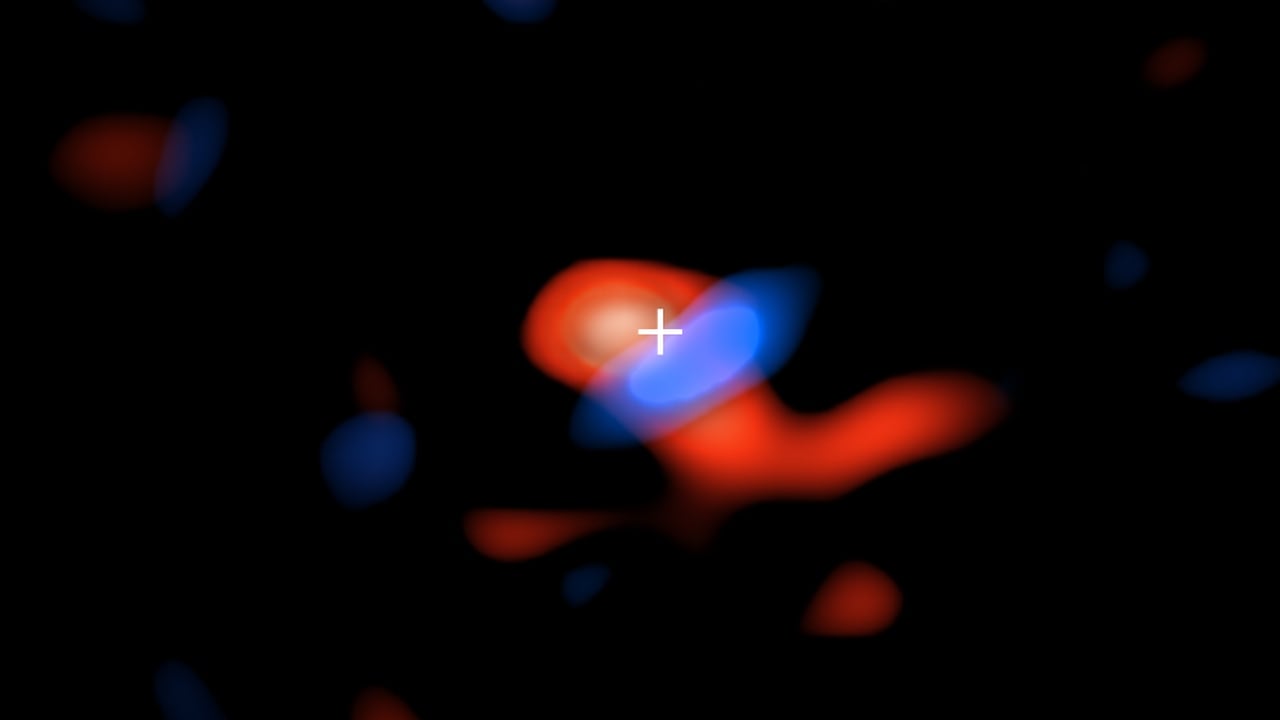 ALMA image of the disk of cool hydrogen gas flowing around the supermassive black hole at the center of our galaxy. The colors represent the motion of the gas relative to Earth: the red portion is moving away, so the radio waves detected by ALMA are slightly stretched, or shifted, to the “redder” portion of the spectrum; the blue color represents gas moving toward Earth, so the radio waves are slightly scrunched, or shifted, to the “bluer” portion of the spectrum. Credit: ALMA (ESO/NAOJ/NRAO), E.M. Murchikova; NRAO/AUI/NSF, S. Dagnello
