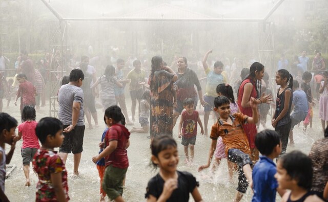 Monsoon is likely to arrive in Delhi around 29 June, the India Meteorological Department (IMD) said on Monday dismissing reports of a delayed arrival in the national capital. Residents of a housing society cooled off with a rain dance organised to beat the heat in Greater Noida on Saturday. AP Monsoon is likely to arrive in Delhi around 29 June, the India Meteorological Department (IMD) said on Monday dismissing reports of a delayed arrival in the national capital. Residents of a housing society cooled off with a rain dance organised to beat the heat in Greater Noida on Saturday. AP