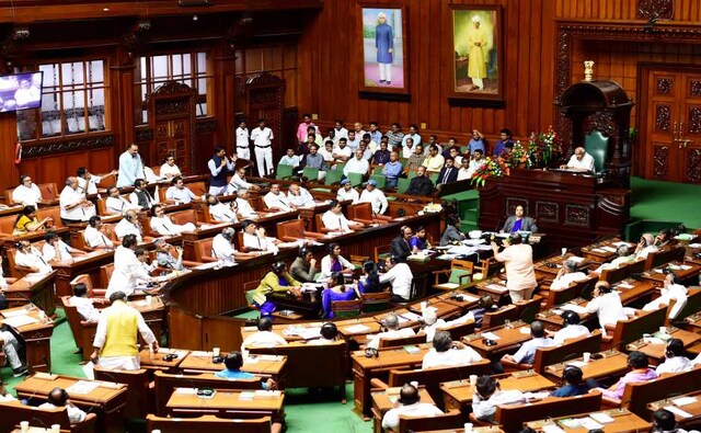 After the House resumed its sitting, JDS-Congress members raised slogans saying, "we want justice, we want discussion." PTI After the House resumed its sitting, JDS-Congress members raised slogans saying, "we want justice, we want discussion." PTI
