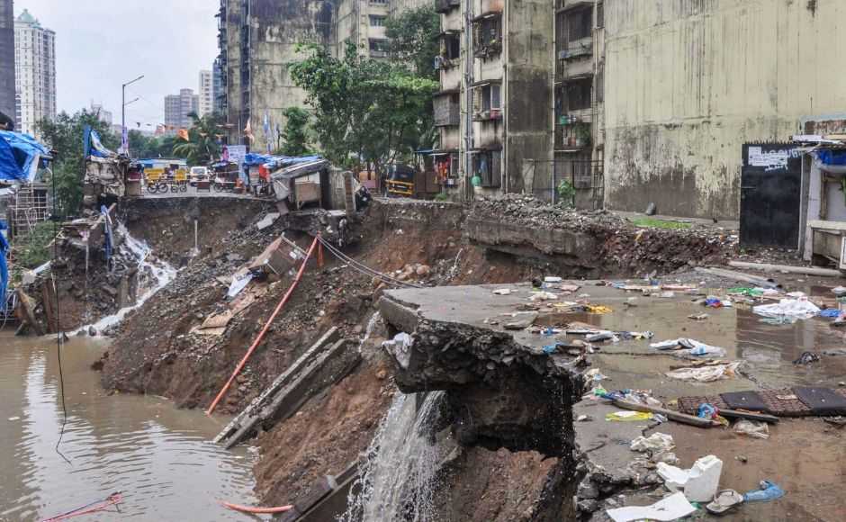 A road caved-in near a construction site in Chandivali's Sangharsh Nagar. A wall collapse in Kalyan in Thane district early Tuesday killed three people, officials said. In Buldhana district, a 52-year-old woman was killed on the spot by a bolt of lightning. PTI A road caved-in near a construction site in Chandivali's Sangharsh Nagar. A wall collapse in Kalyan in Thane district early Tuesday killed three people, officials said. In Buldhana district, a 52-year-old woman was killed on the spot by a bolt of lightning. PTI