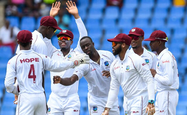Jason Holder has put India into bat first and his decision was justified by the display for his new ball bowlers. Kemar Roach and Shannon Gabriel dented India batting quite quickly. AFP Jason Holder has put India into bat first and his decision was justified by the display for his new ball bowlers. Kemar Roach and Shannon Gabriel dented India batting quite quickly. AFP