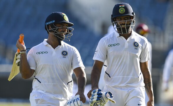 Captain Jason Holder removed Virat Kohli for 76 but middle-order batsmen Hanuma Vihari and Rishabh Pant shared a 62-run partnership to make sure India have the upper hand after conclusion of opening day's play. AFP Captain Jason Holder removed Virat Kohli for 76 but middle-order batsmen Hanuma Vihari and Rishabh Pant shared a 62-run partnership to make sure India have the upper hand after conclusion of opening day's play. AFP