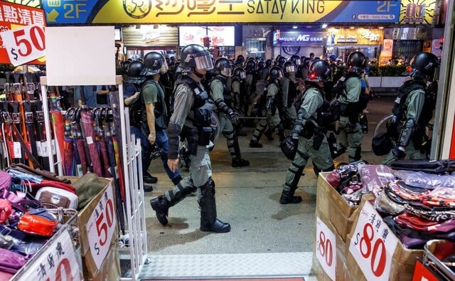 Streets in the city continue to be swarmed with riot police as they chase down anti-government protesters. Demonstrations against the bill began in Hong Kong in March 2019. Reuters/ Thomas Peter Streets in the city continue to be swarmed with riot police as they chase down anti-government protesters. Demonstrations against the bill began in Hong Kong in March 2019. Reuters/ Thomas Peter