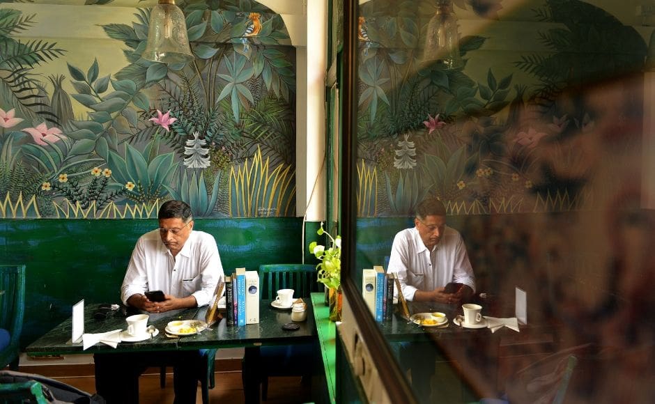 Traversing through Shillong, Delhi and Udupi, Reading Spaces attempts to explore the intimate and interactive relationship between readers and their environments. Featured in this image is economist Arvind Subramaniam in a cafe at Khan Market in New Delhi. Traversing through Shillong, Delhi and Udupi, Reading Spaces attempts to explore the intimate and interactive relationship between readers and their environments. Featured in this image is economist Arvind Subramaniam in a cafe at Khan Market in New Delhi.