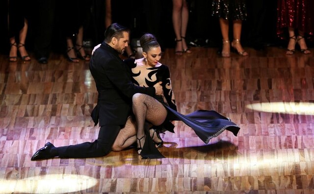 Fernando Andres Rodriguez and Estefania Belen Gomez, representing Rio Negro, Argentina, perform after placing first in the Stage style final at the Tango World Championship in Buenos Aires. Reuters/ Agustin Marcarian Fernando Andres Rodriguez and Estefania Belen Gomez, representing Rio Negro, Argentina, perform after placing first in the Stage style final at the Tango World Championship in Buenos Aires. Reuters/ Agustin Marcarian