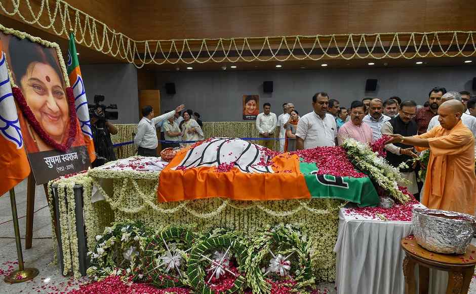 Uttar Pradesh chief minister Yogi Adityanath paid floral tribute to former external affairs minister Sushma Swaraj at the BJP headquarters. PTI Uttar Pradesh chief minister Yogi Adityanath paid floral tribute to former external affairs minister Sushma Swaraj at the BJP headquarters. PTI