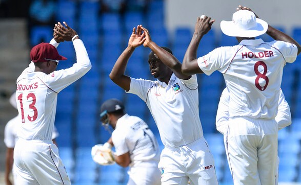 West Indies' Kemar Roach celebrates after dismissing Rishabh Pant, who was the first to be dismissed on the day. roach finished with figures of 4-66 as India were bundled out for 297. AFP West Indies' Kemar Roach celebrates after dismissing Rishabh Pant, who was the first to be dismissed on the day. roach finished with figures of 4-66 as India were bundled out for 297. AFP