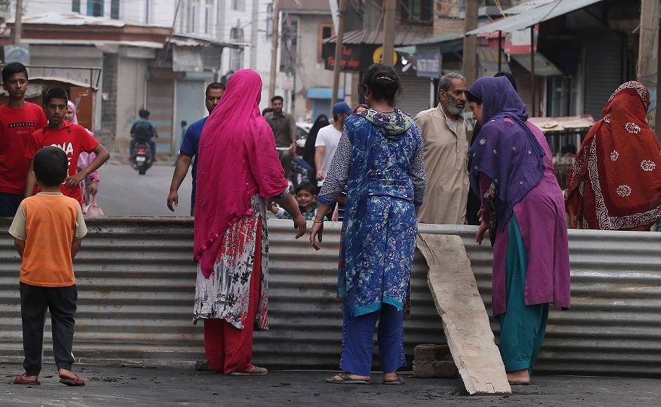 Mobile phone services will be relaxed soon and 46 out of 96 landline telephone exchanges are functional now, Malik said. He said the restrictions that remain in place are to ensure that no lives are lost. Seen here are Srinagar residents standing near a blockade put up by locals to prevent security personnel from entering their neighbourhood. Reuters Mobile phone services will be relaxed soon and 46 out of 96 landline telephone exchanges are functional now, Malik said. He said the restrictions that remain in place are to ensure that no lives are lost. Seen here are Srinagar residents standing near a blockade put up by locals to prevent security personnel from entering their neighbourhood. Reuters