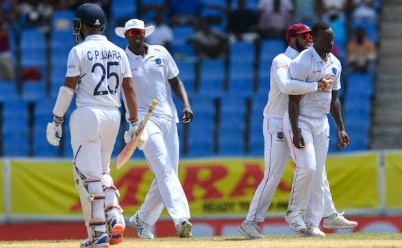 Cheteshwar Pujara departed for 25 as he was clean bowled by Kemar Roach. AFP Cheteshwar Pujara departed for 25 as he was clean bowled by Kemar Roach. AFP