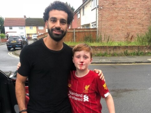 Mohamed Salah shows compassionate side as 'Egyptian King' comforts young Liverpool fan who injured his nose Mohamed Salah shows compassionate side as 'Egyptian King' comforts young Liverpool fan who injured his nose