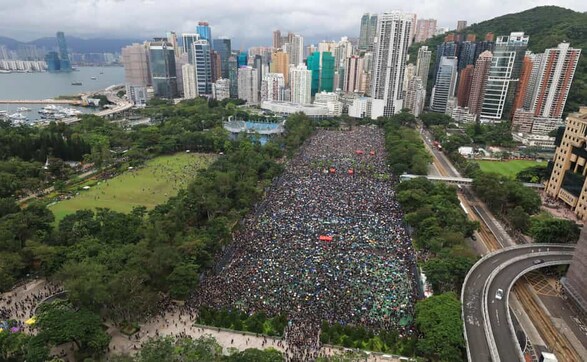 Hong Kong protests: Agitators march through rains to seek democracy, political reforms in semi-autonomous Chinese territory Hong Kong protests: Agitators march through rains to seek democracy, political reforms in semi-autonomous Chinese territory