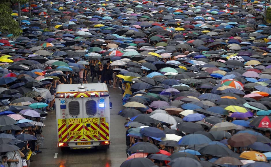 Protesters make space for an ambulance to travel during the Sunday rally in Hong Kong. AP Protesters make space for an ambulance to travel during the Sunday rally in Hong Kong. AP