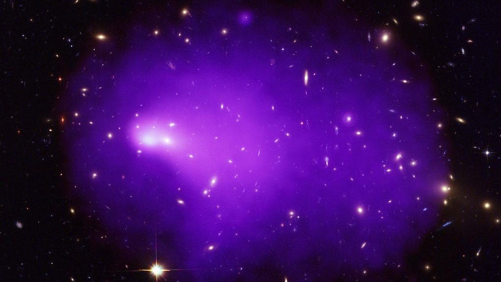 Abell 2146 is the result of a collision and merger between two galaxy clusters. Chandra's X-ray is the purple colour, shows hot gas and the and optical data from the Hubble Space Telescope shows galaxies and stars. Image credit: NASA/CXC Abell 2146 is the result of a collision and merger between two galaxy clusters. Chandra's X-ray is the purple colour, shows hot gas and the and optical data from the Hubble Space Telescope shows galaxies and stars. Image credit: NASA/CXC