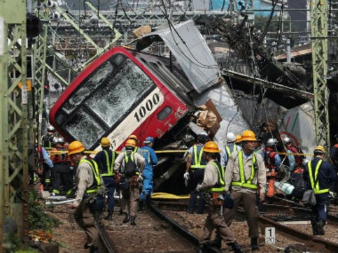 One killed, 30 injured in Japan after express train, truck collide on busy line connecting Tokyo and Yokohama One killed, 30 injured in Japan after express train, truck collide on busy line connecting Tokyo and Yokohama