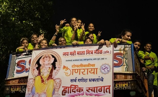 The best view of the procession is from the top of the trucks carrying the Ganpati to the beach. Clay idols are installed privately in homes during the festival, but more prominently, local societies or <em>mandals</em> create temporary stages in public spaces to set-up a huge Ganesha statue with an entire locality coming together and contributing funds towards the 10-day-long festivities. The best view of the procession is from the top of the trucks carrying the Ganpati to the beach. Clay idols are installed privately in homes during the festival, but more prominently, local societies or <em>mandals</em> create temporary stages in public spaces to set-up a huge Ganesha statue with an entire locality coming together and contributing funds towards the 10-day-long festivities.