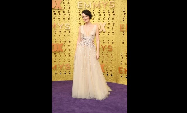Pheobe Waller-Bridge wore a glittering Monique Lhuillier gown, complete with sequins, and a blush-colored tulle skirt | Twitter Pheobe Waller-Bridge wore a glittering Monique Lhuillier gown, complete with sequins, and a blush-colored tulle skirt | Twitter