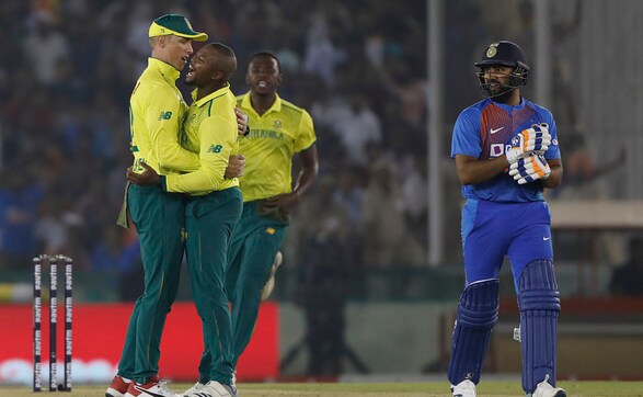 South Africa's Andile Phehlukwayo celebrates after dismissing opener Rohit Sharma, who scored just 12 runs. AP South Africa's Andile Phehlukwayo celebrates after dismissing opener Rohit Sharma, who scored just 12 runs. AP