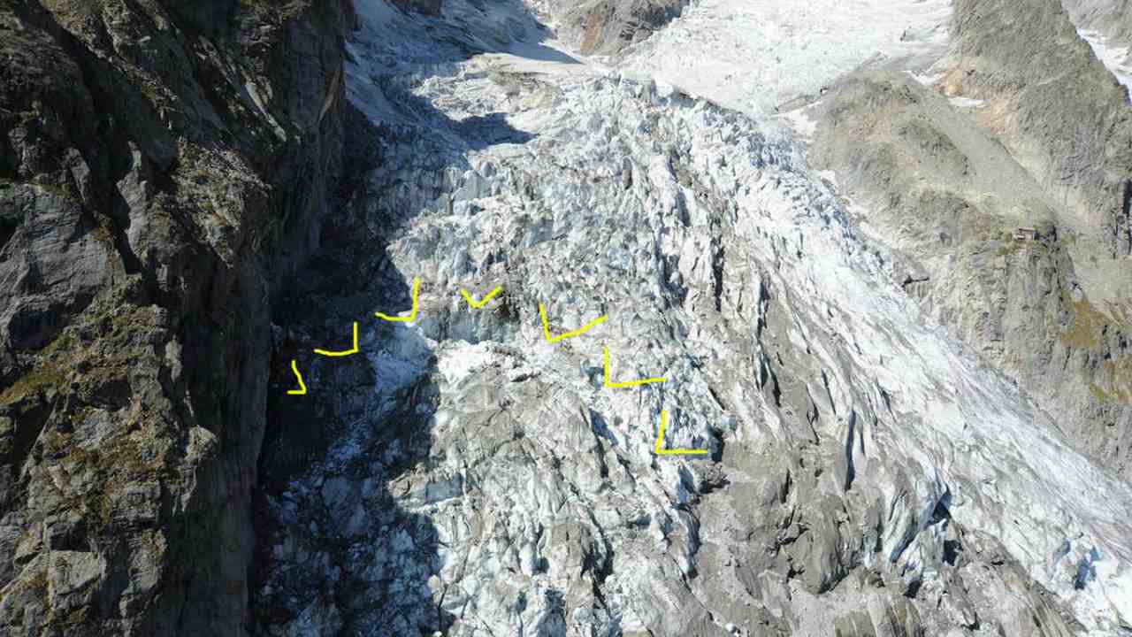 About 250,000 cubic meters of ice (highlighted in yellow) are at imminent risk of collapse from the Planpincieux glacier along the Italian side of the Mont Blanc massif. Italian authorities have closed roads and evacuated mountain huts. image credit: Courmayeur Press Office/EPA