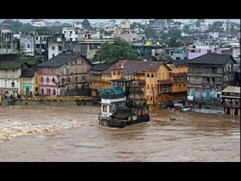 Flood alert raised in Andhra Pradesh as river Godavari crosses 50-ft mark in Bhadrachalam; runs two feet less than third warning of 53-ft Flood alert raised in Andhra Pradesh as river Godavari crosses 50-ft mark in Bhadrachalam; runs two feet less than third warning of 53-ft