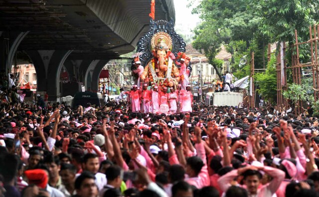 Celebrated on the fourteenth day of the lunar fortnight, Ganeshotsav is concluded seeking blessings of the elephant-headed God. Grand processions can be observed as part of the festival. Sachin Gokhale/Firstpost Celebrated on the fourteenth day of the lunar fortnight, Ganeshotsav is concluded seeking blessings of the elephant-headed God. Grand processions can be observed as part of the festival. Sachin Gokhale/Firstpost
