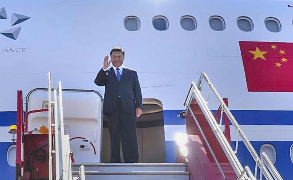 Chinese President Xi Jinping arrived at the airport in Chennai on Friday for the informal bilateral summit with Prime Minister Modi. He was welcomed with a cultural programme featuring over 500 performers. PTI Chinese President Xi Jinping arrived at the airport in Chennai on Friday for the informal bilateral summit with Prime Minister Modi. He was welcomed with a cultural programme featuring over 500 performers. PTI