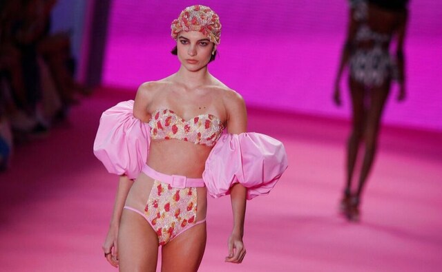 A model wears a creation from the Patbo collection, a mix of swimwear and party couture, during Sao Paulo Fashion Week in Sao Paulo, Brazil. The Associated Press/Nelson Antoine A model wears a creation from the Patbo collection, a mix of swimwear and party couture, during Sao Paulo Fashion Week in Sao Paulo, Brazil. The Associated Press/Nelson Antoine