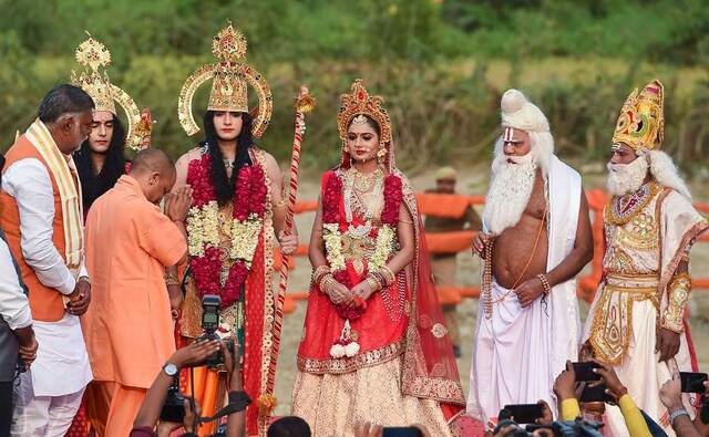 The stage at the amphitheatre-style Ram Katha Park was made to imitate the "courtroom of a grand palace" where the <em>rajya abhishek</em> (coronation) of the symbolic Lord Ram, Sita and Lakshman was done, followed by their aarti by the chief minister and Ramlila performances. A 'Ram Darbar' was erected at the Ram Ki Paidi ghat in Ayodhya. PTI The stage at the amphitheatre-style Ram Katha Park was made to imitate the "courtroom of a grand palace" where the <em>rajya abhishek</em> (coronation) of the symbolic Lord Ram, Sita and Lakshman was done, followed by their aarti by the chief minister and Ramlila performances. A 'Ram Darbar' was erected at the Ram Ki Paidi ghat in Ayodhya. PTI
