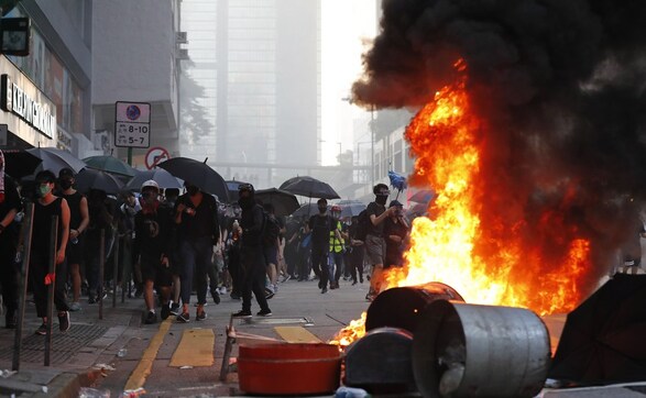 Hong Kong protesters take to streets in defiance of police ban on 70th anniversary of Communist China Hong Kong protesters take to streets in defiance of police ban on 70th anniversary of Communist China