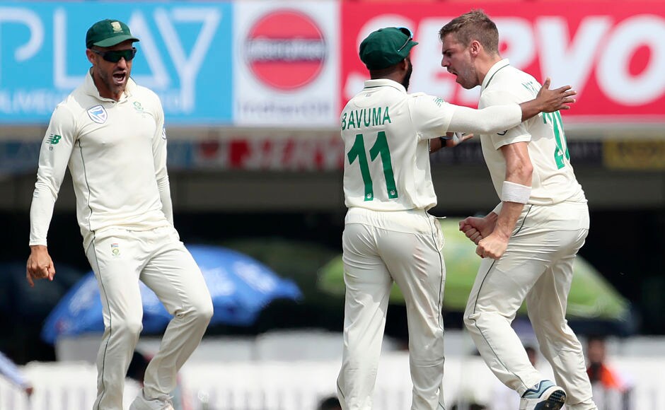 Anrich Nortje (extreme right) celebrated passionately as he picked his maiden Test wicket. The big reason for this animated celebration was the fact that he had removed Virat Kohli. AP Anrich Nortje (extreme right) celebrated passionately as he picked his maiden Test wicket. The big reason for this animated celebration was the fact that he had removed Virat Kohli. AP