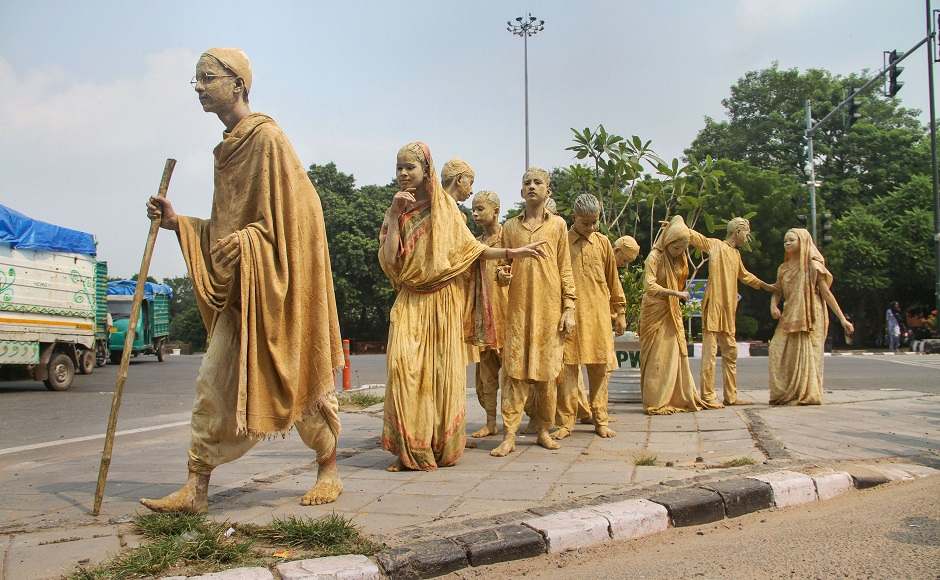 Children, dressed up like Mahatma Gandhi and other freedom-fighters, pose like the famous 'Gyarah Murti' depicting 'Dandi March'. PTI Children, dressed up like Mahatma Gandhi and other freedom-fighters, pose like the famous 'Gyarah Murti' depicting 'Dandi March'. PTI