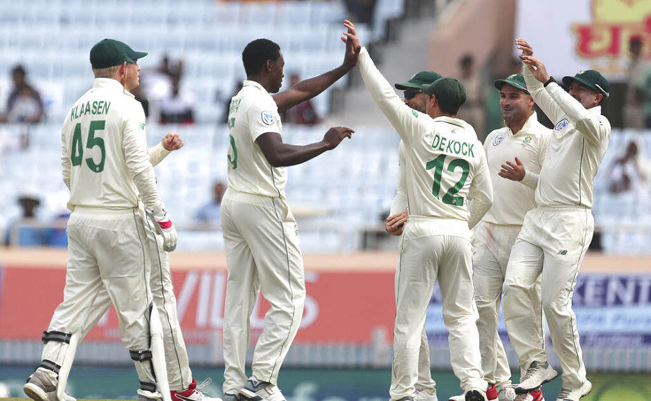 Kagiso Rabada, third left, was at his lethal best at the start of the day, removing opener Mayank Agarwal and Cheteshwar Pujara cheaply after India won the toss and decided to bat first. AP Kagiso Rabada, third left, was at his lethal best at the start of the day, removing opener Mayank Agarwal and Cheteshwar Pujara cheaply after India won the toss and decided to bat first. AP