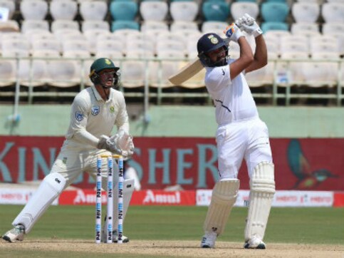 India vs South Africa: Rohit Sharma's maiden ton as opener powers hosts to 202/0 as rain forces early stumps on Day 1 India vs South Africa: Rohit Sharma's maiden ton as opener powers hosts to 202/0 as rain forces early stumps on Day 1