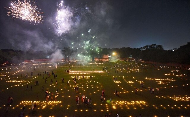 A sports complex was transformed as sportspersons lit lamps and candles at Madan Mohan Malviya Stadium during 'track pujan' ahead of Diwali in Allahabad. PTI A sports complex was transformed as sportspersons lit lamps and candles at Madan Mohan Malviya Stadium during 'track pujan' ahead of Diwali in Allahabad. PTI