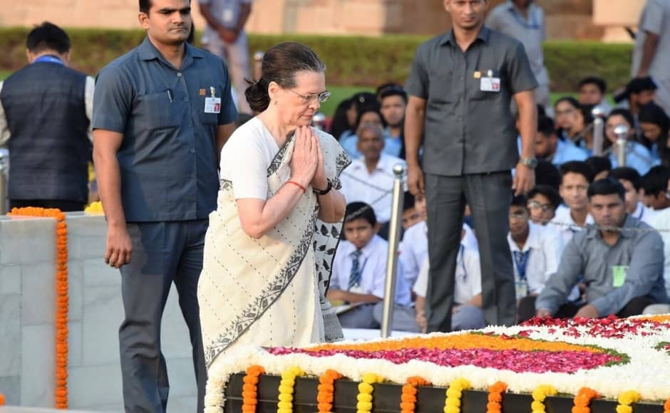 Congress interim president Sonia Gandhi pays respects to Mahatma Gandhi. Later, while addressing a gathering of Congress workers, Sonia slammed the BJP and said, "Quoting Gandhi is easy but it is tough to follow his path. Those who are trying to use his name but are taking India astray from his teachings will not succeed. Twitter@INCIndia Congress interim president Sonia Gandhi pays respects to Mahatma Gandhi. Later, while addressing a gathering of Congress workers, Sonia slammed the BJP and said, "Quoting Gandhi is easy but it is tough to follow his path. Those who are trying to use his name but are taking India astray from his teachings will not succeed. Twitter@INCIndia