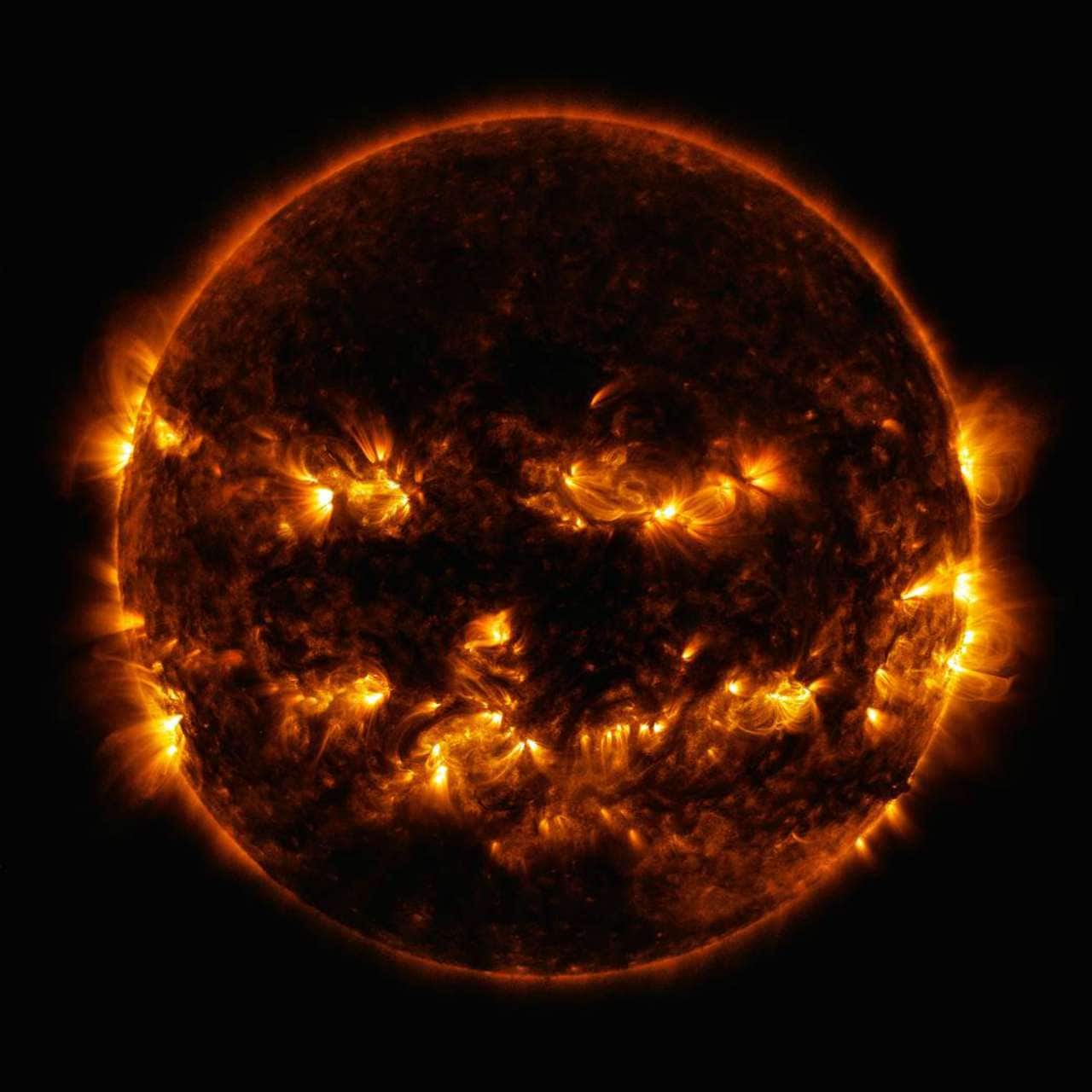 NASA celebrates spooky season with some epic movie posters and a creepy photo of the sun