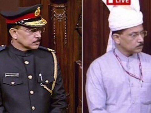 Rajya Sabha marshals get new look on first day of Parliament's Winter Session: Traditional attire gives way to navy blue jacket and cap Rajya Sabha marshals get new look on first day of Parliament's Winter Session: Traditional attire gives way to navy blue jacket and cap