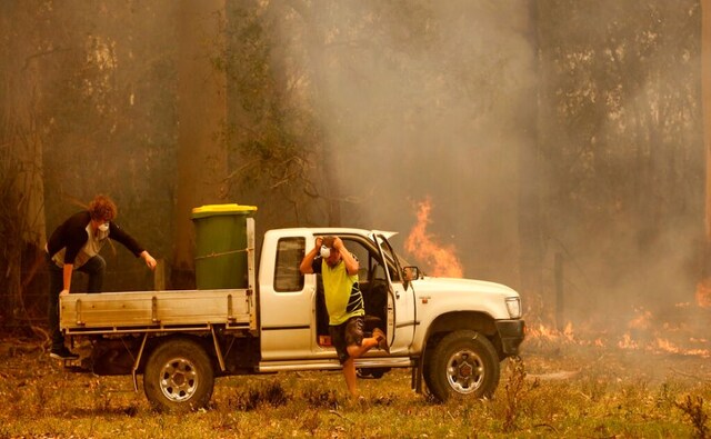 The toll from the fires rose to four on Thursday after police reported the body of a man in New South Wales bushland. The wildfires in New South Wales and Queensland states have destroyed hundreds of homes and wiped out 25 lakh acres of farmland and bush over the past week. AP The toll from the fires rose to four on Thursday after police reported the body of a man in New South Wales bushland. The wildfires in New South Wales and Queensland states have destroyed hundreds of homes and wiped out 25 lakh acres of farmland and bush over the past week. AP