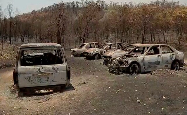 At least 50 homes were damaged or destroyed in New South Wales by wildfires that had burnt into the suburbs of Sydney, Australia’s largest city. A weeklong state of emergency was declared for New South Wales because of the extraordinary fire danger. AP At least 50 homes were damaged or destroyed in New South Wales by wildfires that had burnt into the suburbs of Sydney, Australia’s largest city. A weeklong state of emergency was declared for New South Wales because of the extraordinary fire danger. AP