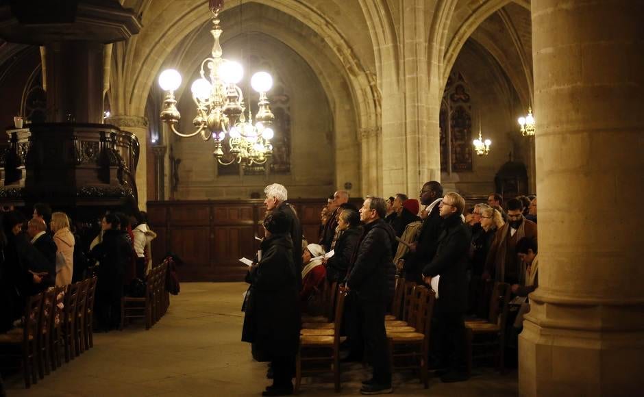 Believers the christmas mass, in Saint-Germain l'Auxerrois church, in Paris, on Tuesday. Notre Dame Cathedral is unable to host Christmas services for the first time since the French Revolution, because the Paris landmark was too deeply damaged by this year's fire. AP Believers the christmas mass, in Saint-Germain l'Auxerrois church, in Paris, on Tuesday. Notre Dame Cathedral is unable to host Christmas services for the first time since the French Revolution, because the Paris landmark was too deeply damaged by this year's fire. AP