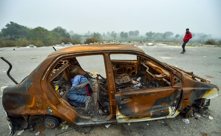Delhi had recorded the season's coldest day on Saturday with the minimum temperature dropping to 2.4 degrees Celsius, witnessing its second-coldest December since 1901. Dense fog enveloped the city reducing visibility to less than 500 metres. Seen here is a homeless man sleeping in an abandoned car. PTI Delhi had recorded the season's coldest day on Saturday with the minimum temperature dropping to 2.4 degrees Celsius, witnessing its second-coldest December since 1901. Dense fog enveloped the city reducing visibility to less than 500 metres. Seen here is a homeless man sleeping in an abandoned car. PTI