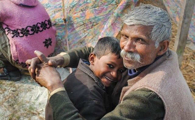 A father and son enjoy their time at the Fair. A father and son enjoy their time at the Fair.