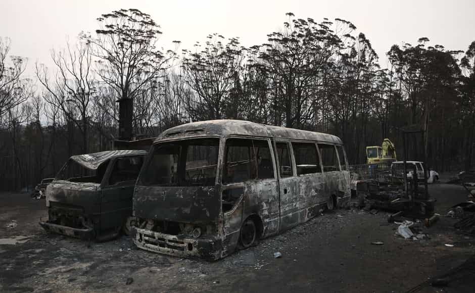 Vehicles gutted by bushfires are seen in the town of Lake Conjola in New South Wales. “We need everybody to leave. We are going to face a worse day on Saturday than what we have been through”, said NSW Transport Minister Andrew Constance. Getty Images Vehicles gutted by bushfires are seen in the town of Lake Conjola in New South Wales. “We need everybody to leave. We are going to face a worse day on Saturday than what we have been through”, said NSW Transport Minister Andrew Constance. Getty Images